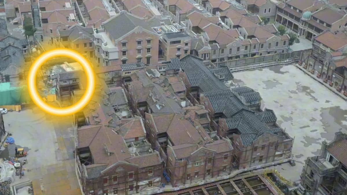432 chinese robots moved an entire 7,500 ton neighborhood before returning it to its original spot to build a subway